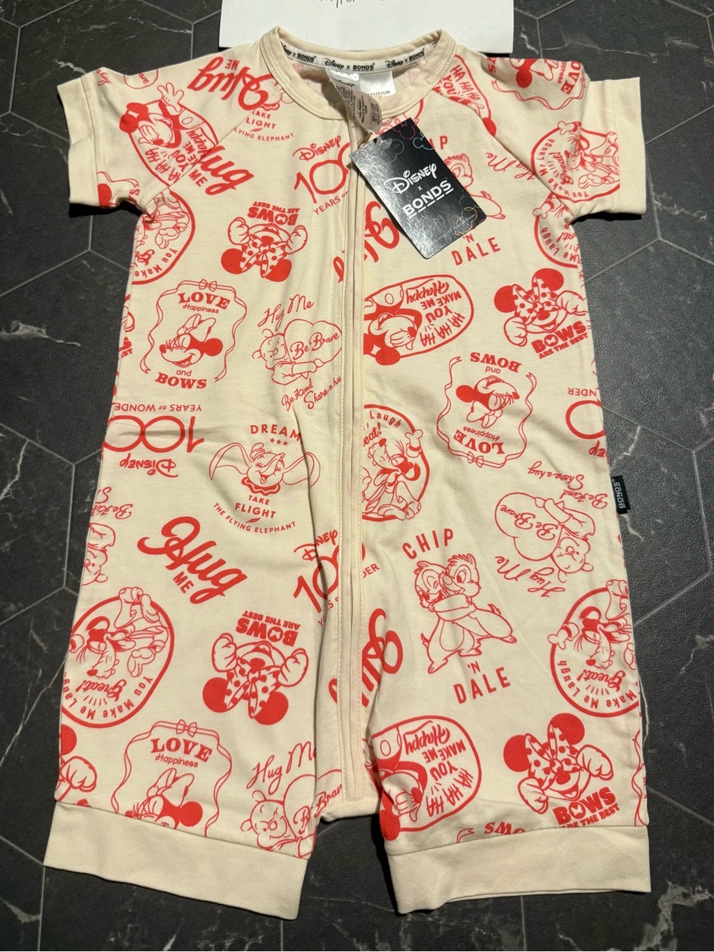Bonds Kids Short Sleeve Zip One-Piece - Cream with Red Disney Print